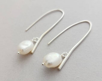 Long sterling silver earrings with pink or white pearls