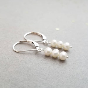 Sterling silver earrings with 3 small pearls image 1