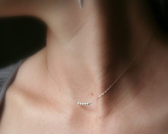 Simple, tiny, sterling silver necklace