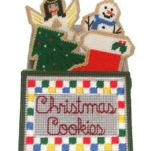 May include: A handmade Christmas-themed needlepoint box featuring an angel, Christmas tree, snowman, and stocking. The box is decorated with a border of colorful squares and the words "Christmas Cookies" in a stitched font.