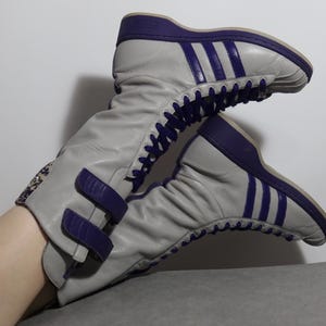 adidas gazelle silver green womens Adidas x Jeremy Scott Women's JS New Wings Footwear White / Black High Top  Sneakers main image 0
