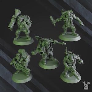May include: Five green plastic miniature figures of orcs, each with a different weapon and pose. The figures are standing on round bases.