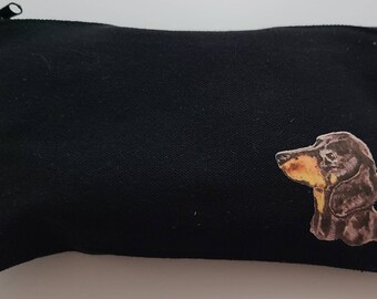 Small zippered pouch for cosmetics, pencils or anything else you want with an iron-on made from my original dachshund drawing