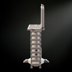 May include: A gray concrete drainage grate with a hinged cover. The cover is open and the grate is raised on a series of concrete steps.
