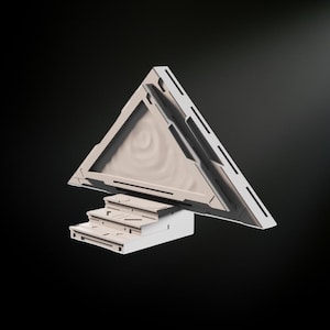 May include: A white, geometric sculpture with a triangular top and a stepped base. The triangle has a textured, light-colored interior. The sculpture has a modern, minimalist design, set against a dark background.