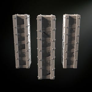 May include: Three gray metal pillars with a textured surface and metal rivets. Each pillar is made of stacked rectangular blocks.