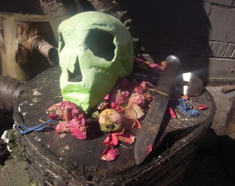 Metal Glow in the Dark Skull sculpture