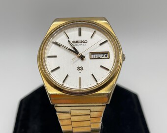 Vintage Seiko SQ 8223-8029 Day Date White Dial Angular
