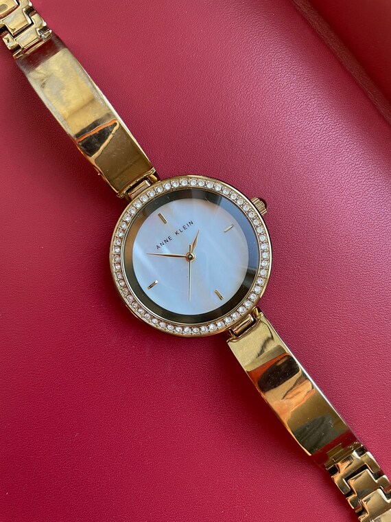 Anne Klein Mother of Pearl Crystal Bezel Gold Tone Quartz  display picture 3