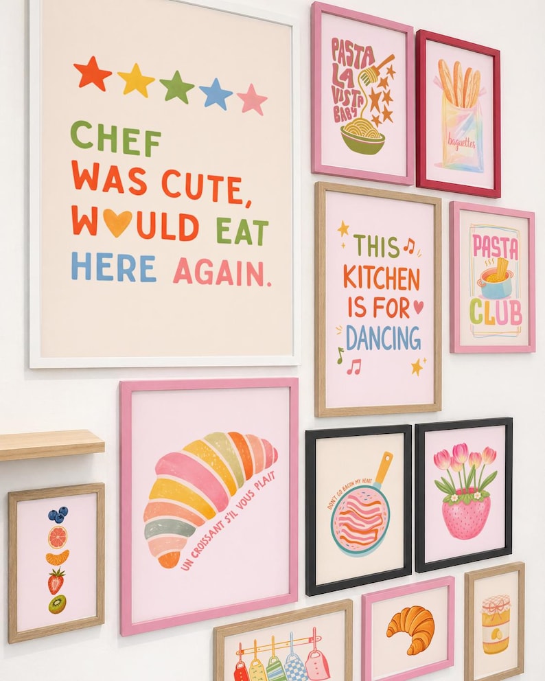 May include: A collection of framed art prints with colorful illustrations and text. Prints include phrases like "Chef Was Cute, Would Eat Here Again" and "This Kitchen Is For Dancing." Other prints feature food items like pasta, croissants, and baguettes.