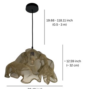 May include: A pendant light with a gold-toned, wavy mesh shade and a black ceiling canopy. The fixture has an adjustable cord length of 19.68 to 118.11 inches. The shade measures approximately 12.59 inches in height and 20.48 inches in width.