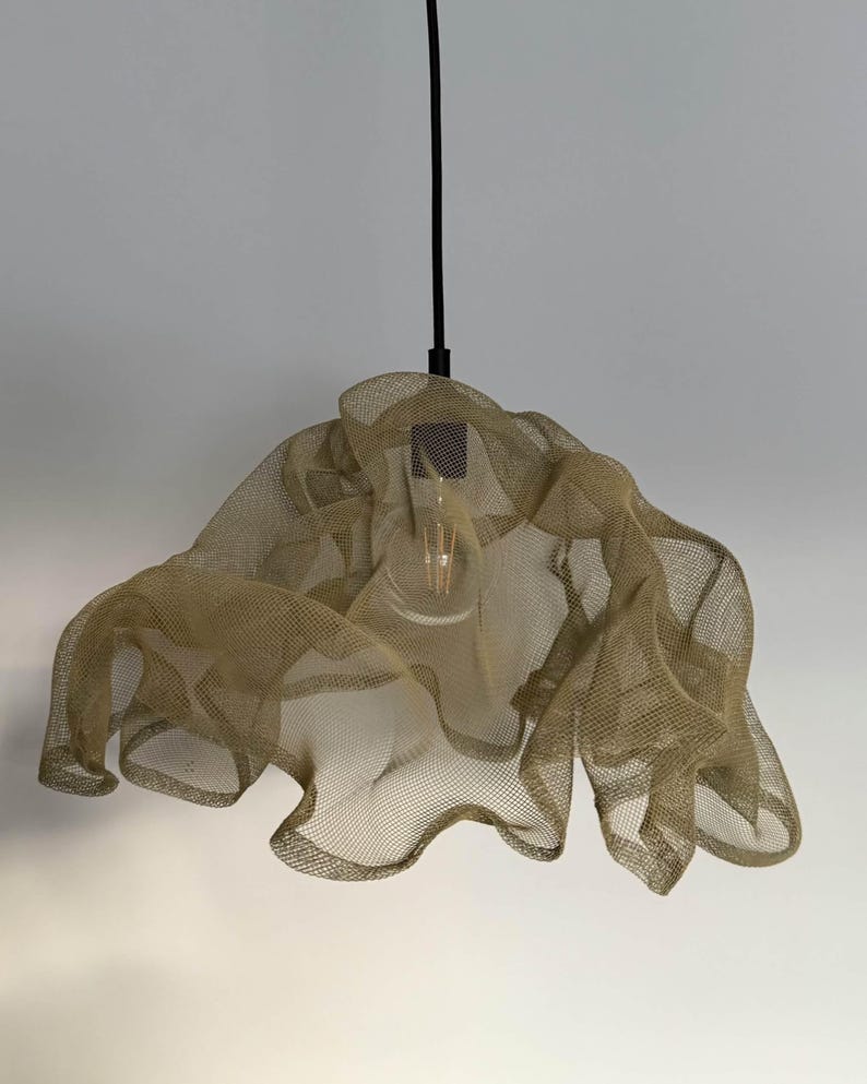 Neutral-tone hanging light fixture, blending seamlessly with minimalist home decor.