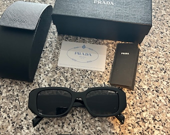 Occhiali da sole Prada unisex neri