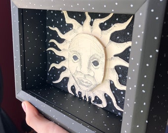 gothic illustrated sun face shadow box