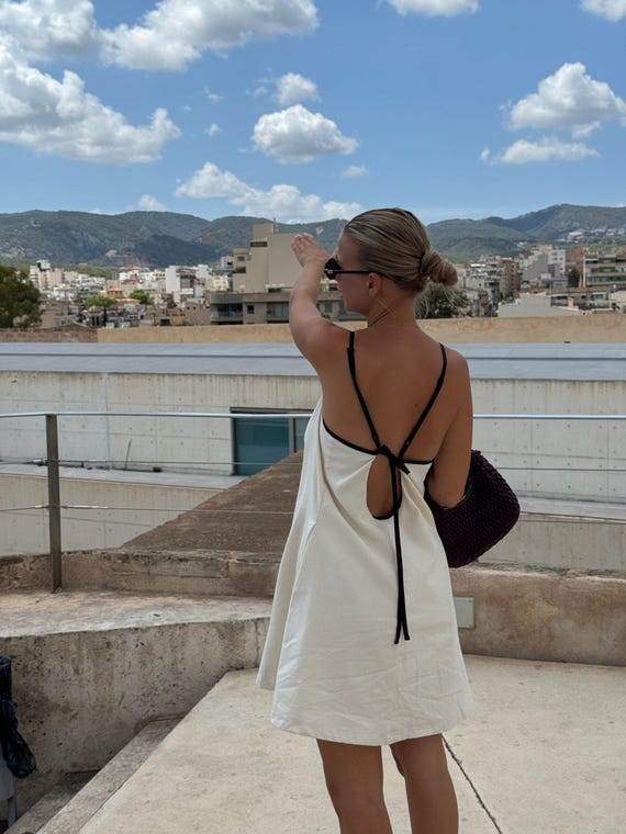 cotton on backless dress Minimalist Sundress: Open Back With Black Tie Straps Self Tie bow backless dress Black Size:XXS / US 0 With its open