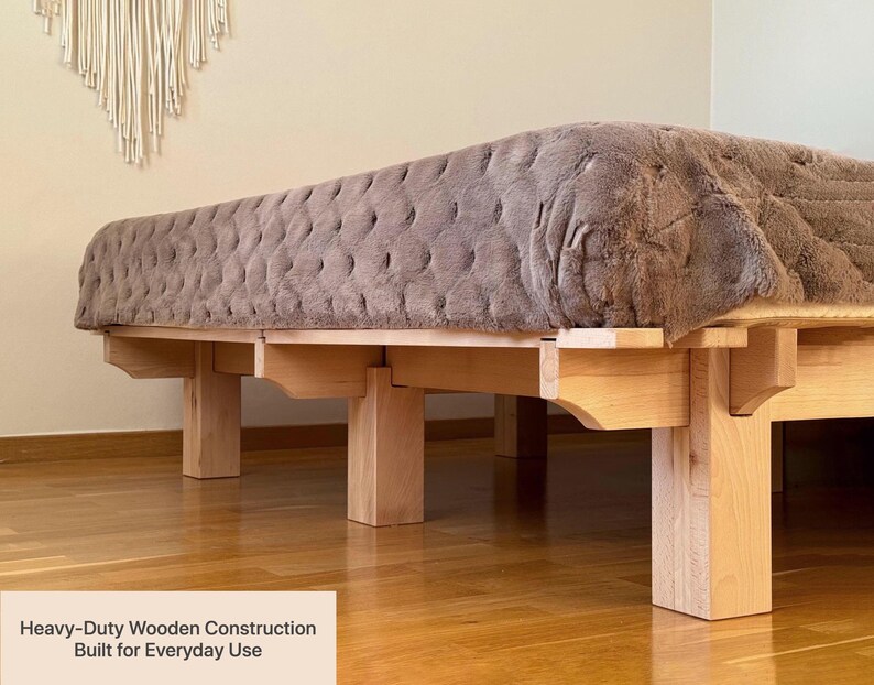 Solid beech wood bed frame with heavy-duty wooden construction and minimalist design