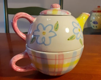 Pastels colored stackable teapot/cup/lid. Neat for display or use. Very sweet hand-painted plaid and flowers design. Like-new condition.