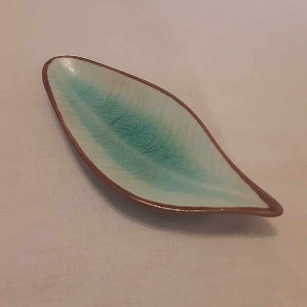 Little beauty hand-painted ceramic leaf ring holder. Excellent condition.