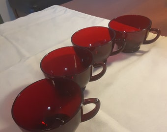 Set of 4 vintage deep ruby red Anchor Hocking coffee/tea cups. Perfect condition. Priced for the set.