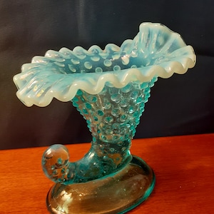 Unique vintage Fenton blue opalescent hobnail cornucopia vase/taper candleholder. 6&quot; tall. Excellent condition.