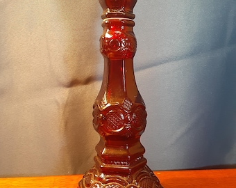Unique Avon deep ruby 1876 Cape Cod taper candleholder/perfume bottle with stopper. 8.5&quot; tall. Avon mark on base. Excellent condition.