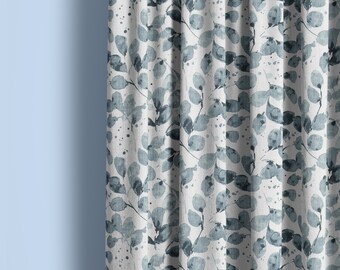 May include: A white curtain with a blue watercolor leaf pattern. The leaves are scattered randomly across the fabric.