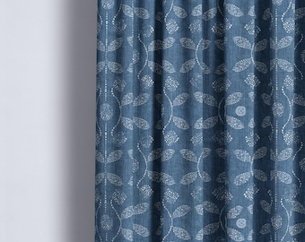 May include: Blue curtains with a white leaf pattern. The leaves are made up of small white dots.