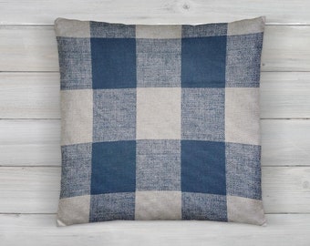 May include: A blue and white checkered throw pillow with a woven texture.