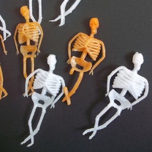 Vintage / Plastic Miniature Skeletons / Set of Nine / Dollhouse Decoration / Vending Prize / Halloween / Scenemakers / Tiny Miniatures