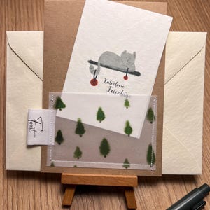selbsthergestellte kreative Katzen Weihnachtskarte mit vernähten Rand