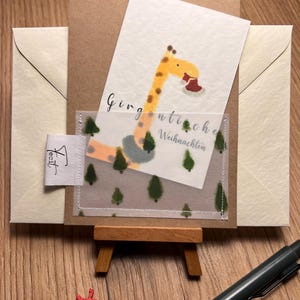 selbsthergestellte witzige Giraffen Weihnachtskarte mit genähten Rand