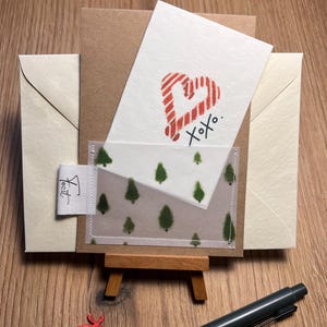 Carte de Noël créative faite maison avec bord cousu