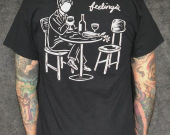 Chad Eaton- FEELINGS- "ROMANCE" on black t-shirt