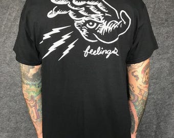 Chad Eaton- FEELINGS- "HAND" on black t-shirt