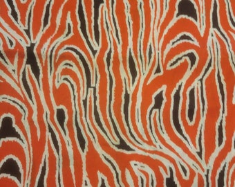 Red and black flame tiger cotton fabric 59"