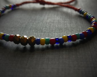 Multicoloured Adjustable Boho Bracelet | Gold Faceted Beads and Red Thread | African Inspired | Colourful Beaded Bracelet | Artisan Bracelet