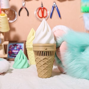 Electric Fursuit Ice Cream Fan 2.0, upgraded with extended battery life and stepless wind control. Ideal portable cooling solution for fursuit enthusiasts and cosplayers, featuring 3D printing, customizable colors, and powerful airflow for events.