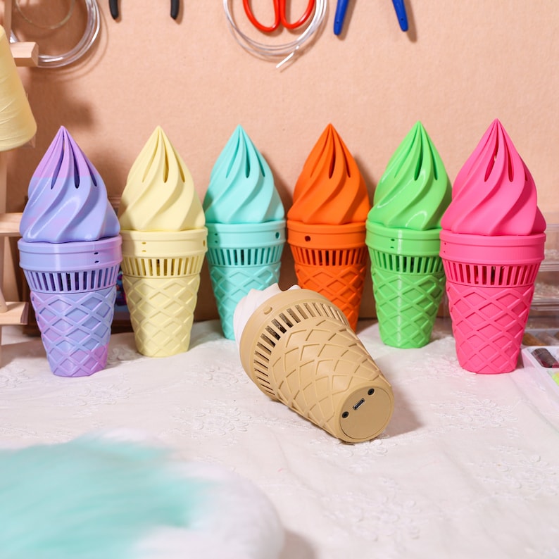 Upgraded Fursuit Ice Cream Fan 2.0, 3D printed portable fan with longer battery life, customizable colors, and stepless wind speed control. Perfect electric cooling fan for cosplay, fursuit enthusiasts, and anyone attending events in heavy costumes
