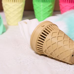 Customizable Fursuit Ice Cream Fan 2.0, 3D printed with longer battery life and powerful wind, up to 30 meters per second. Designed for fursuiters and cosplayers, this portable fan features stepless speed control, ensuring comfort conventions events