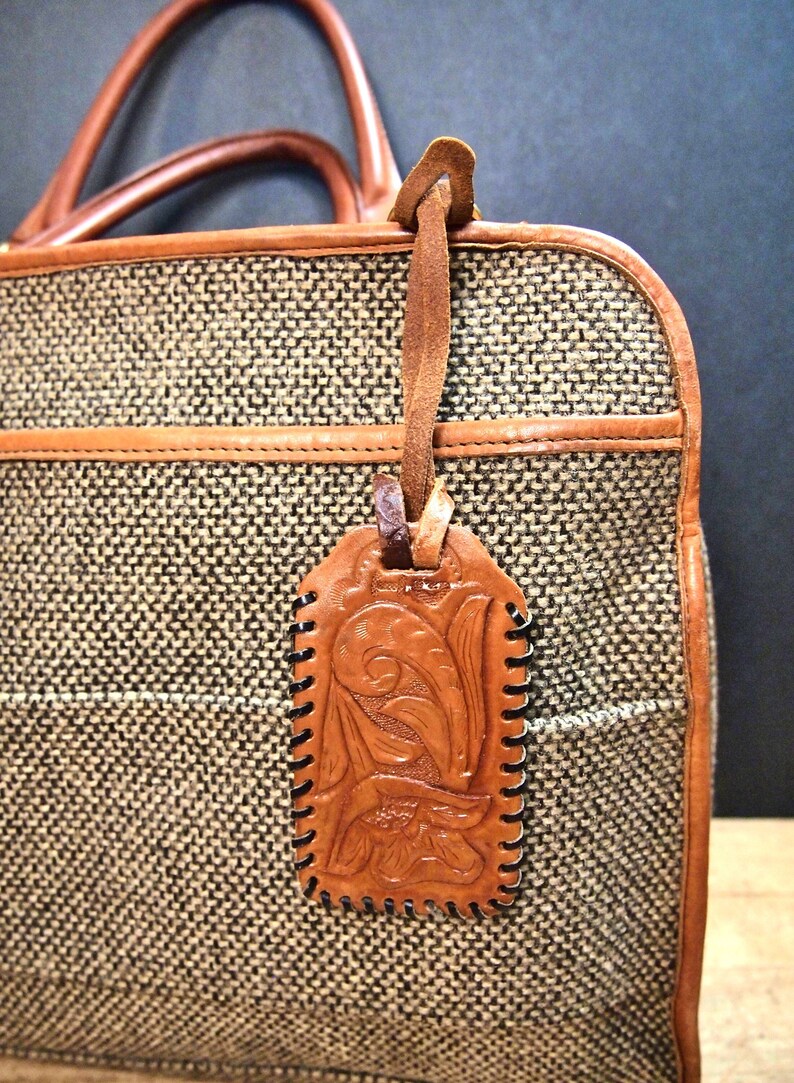tooled leather luggage