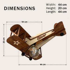 Natural wood airplane lamp dimensions – handmade wooden biplane ceiling lamp size.