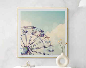 May include: A framed photograph of a vintage Ferris wheel against a blue sky with white clouds. The Ferris wheel has colorful gondolas and is partially visible in the image.