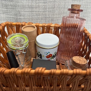 Opening and Closing Containers Materials for Practical Life Montessori Lessons with Seven Small Containers in a  Rectangular Wicker Basket