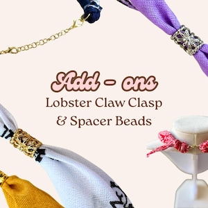 May include: Image features various fabric accessories with gold-colored lobster claw clasps and spacer beads. The accessories are in shades of yellow, white, navy, and purple. Text reads "Add-ons Lobster Claw Clasp & Spacer Beads."