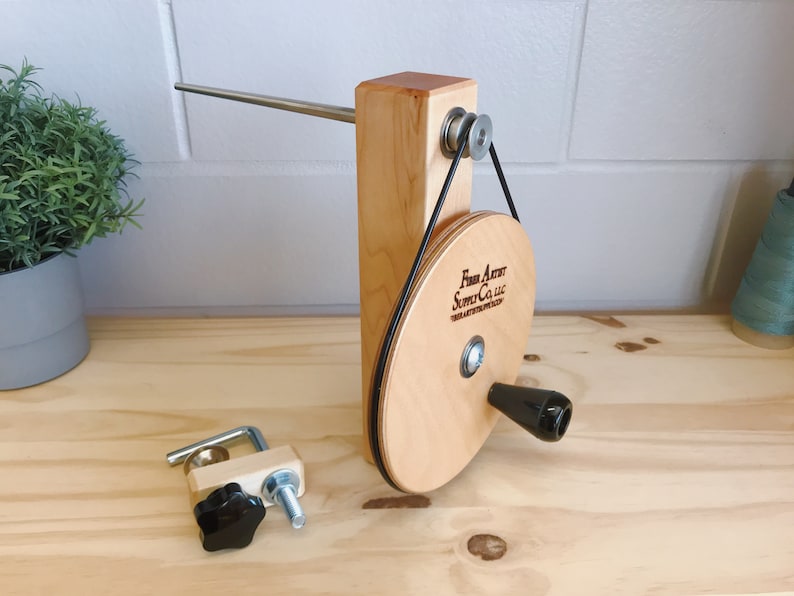 Handcrafted Maple Weavers' Shuttle Bobbin Winder for use with bobbins, weaving loom and boat shuttle. Watch our demonstration video image 1