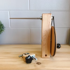Handcrafted Maple Weavers' Shuttle Bobbin Winder for use with bobbins, weaving loom and boat shuttle. Watch our demonstration video image 3