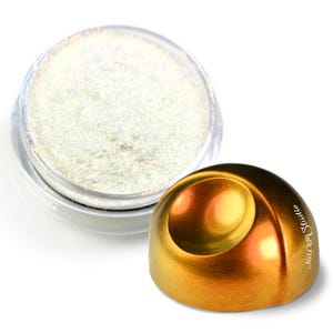 May include: A small jar of iridescent white glitter and a golden metallic chocolate mold with the text "Jouga Studio" on the side.