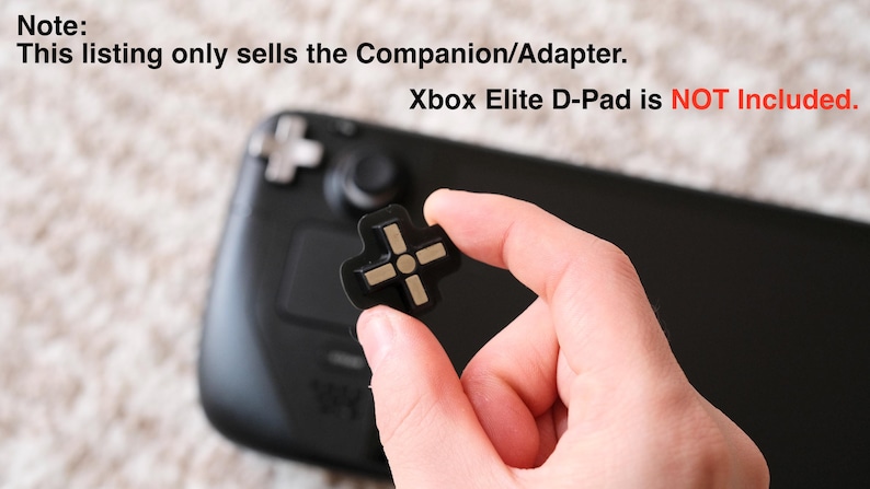 May include: Black and gold D-pad companion/adapter held in hand, with a black game controller in the background. The text in the image states that the Xbox Elite D-Pad is not included.