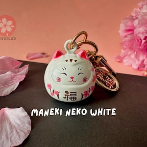 Maneki Neko Lucky Cat-sleutelhanger: Japanse bedel met belletje