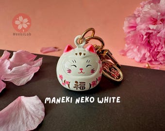 Maneki Neko Lucky Cat-sleutelhanger: Japanse bedel met belletje